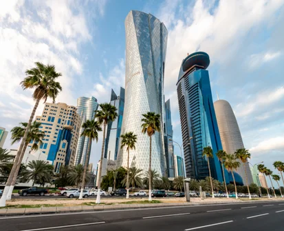 West Bay towers along a Doha boulevard